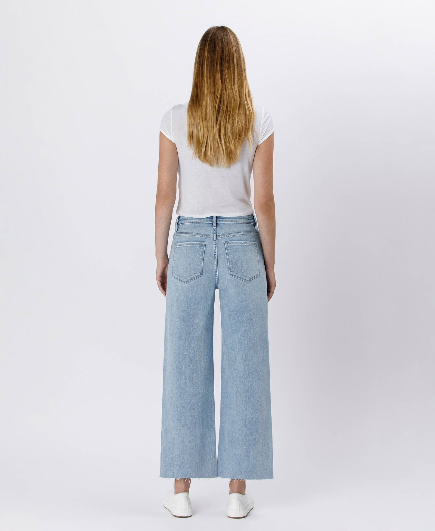 HIGH RISE LIGHT WASH RAW HEM WIDE LEG